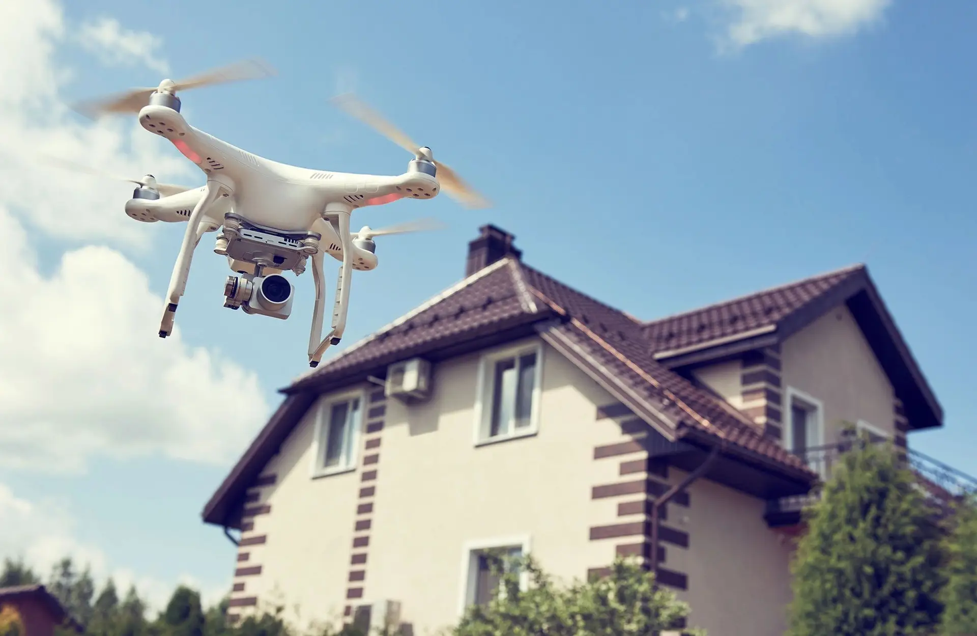 Drone-assisted roof inspection feeding the same-day digital report